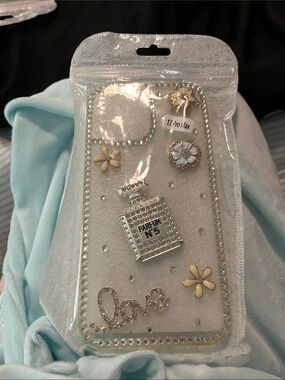 White Rhinestone Parfum Bottle Decorative Phone Case (13 Pro Max)